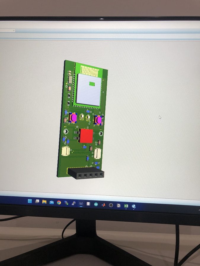 3D CAD render of the custom sensor node PCB on a monitor